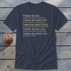 Navy t-shirt with white and yellow text listing "Things We Did," "Didn't Do," "Want To Do," "Will Do," and "Won't Do."