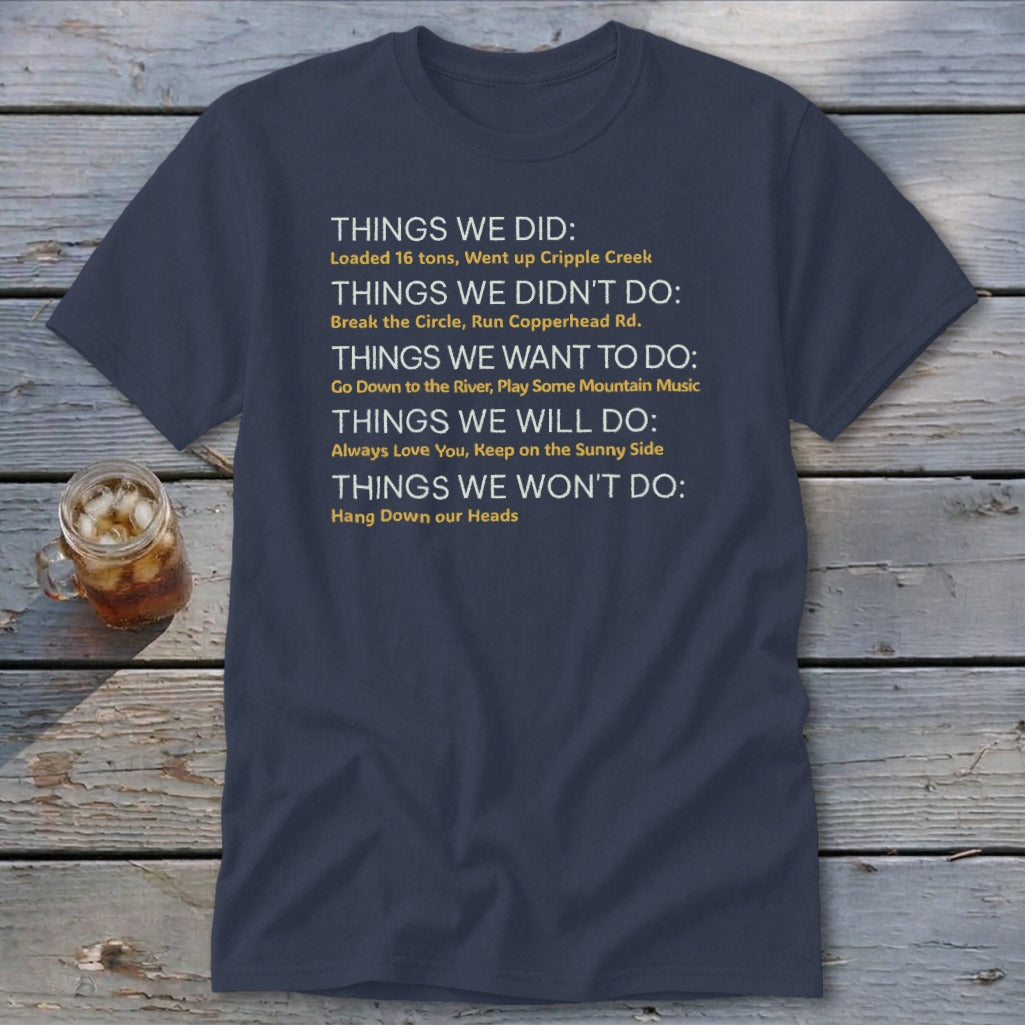 Navy t-shirt with white and yellow text listing "Things We Did," "Didn't Do," "Want To Do," "Will Do," and "Won't Do."