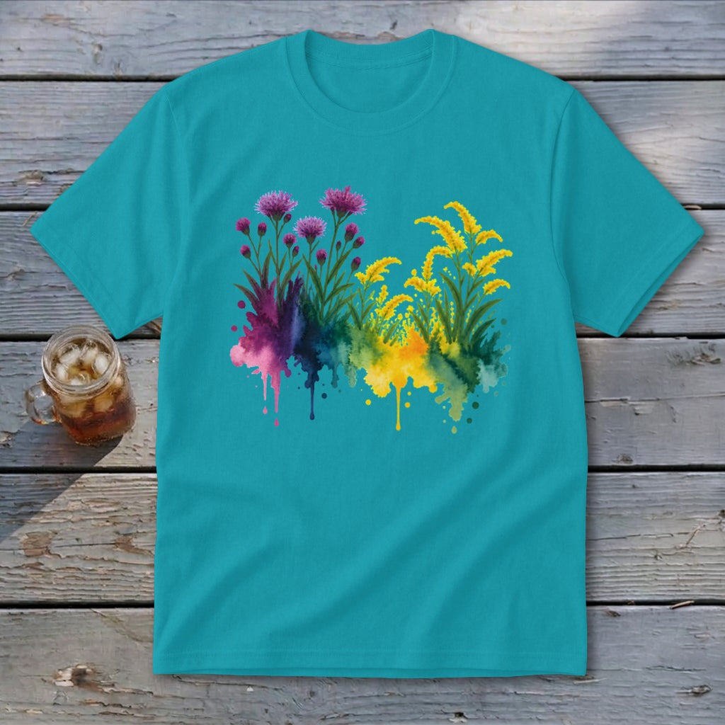 Teal t-shirt with watercolor floral design of pink thistles and yellow wildflowers.
