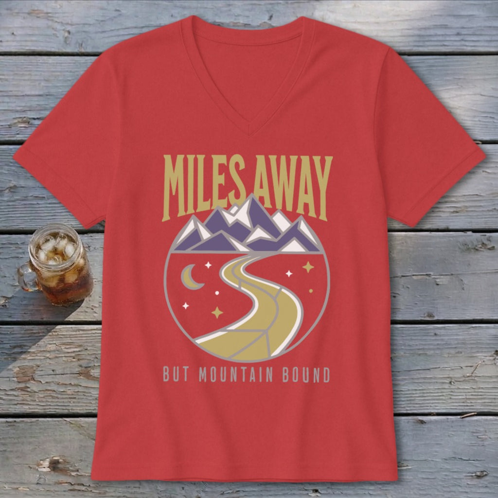 Red v-neck t-shirt with "Miles Away But Mountain Bound" text and mountain road scene.