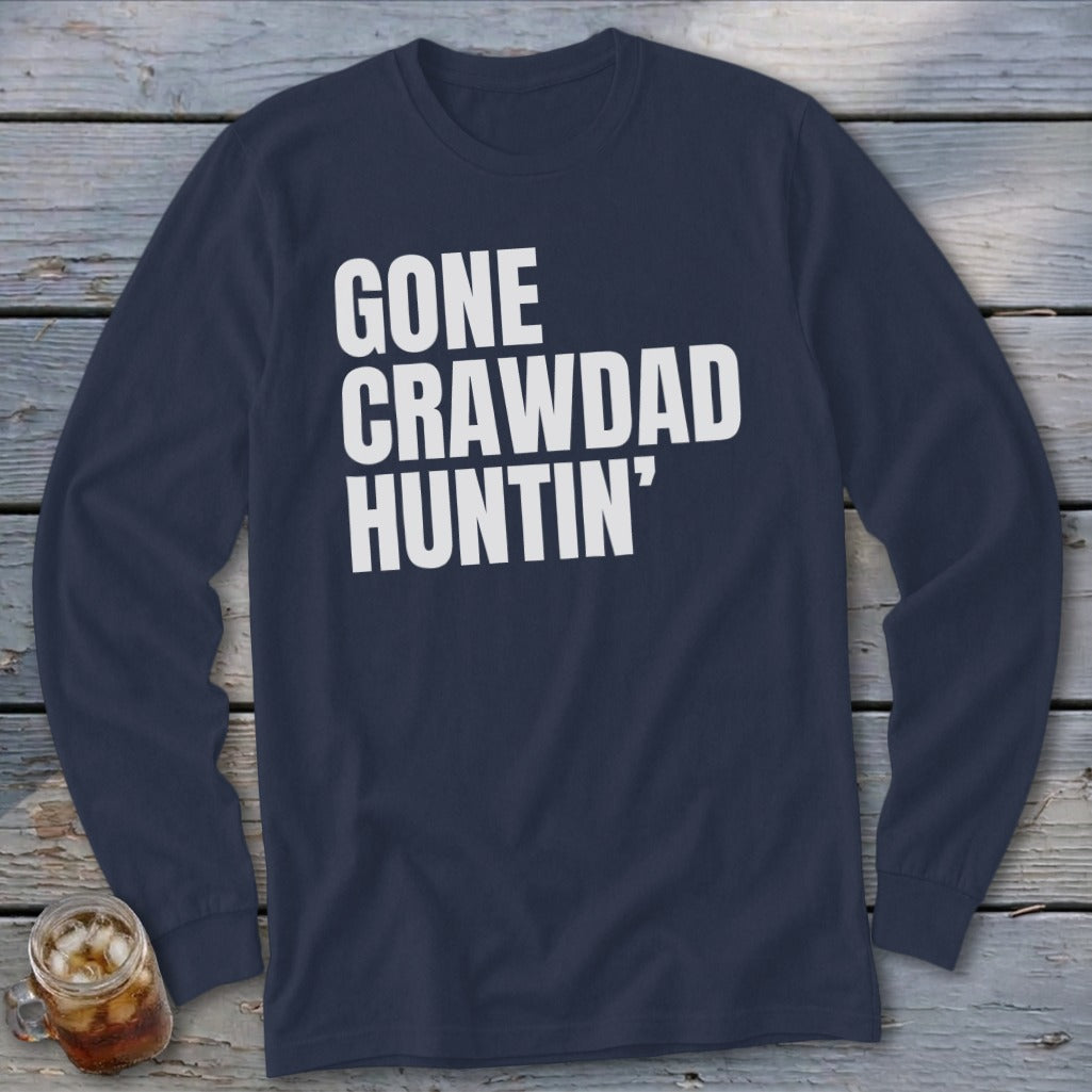 Navy long-sleeve shirt with white text reading "GONE CRAWDAD HUNTIN'"