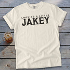 Cream t-shirt with "LOOKING A LITTLE JAKEY" text and a mason jar of iced tea.