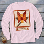 Pink long-sleeve shirt with a square quilted maple leaf design and "Maple Leaf" text.