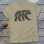 Olive green t-shirt featuring a walking bear graphic with the word Appalachia inside its body.