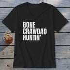 Black v-neck t-shirt with "GONE CRAWDAD HUNTIN'" in white text.