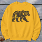 Gold crewneck sweatshirt featuring a brown bear graphic filled with the word Appalachia.