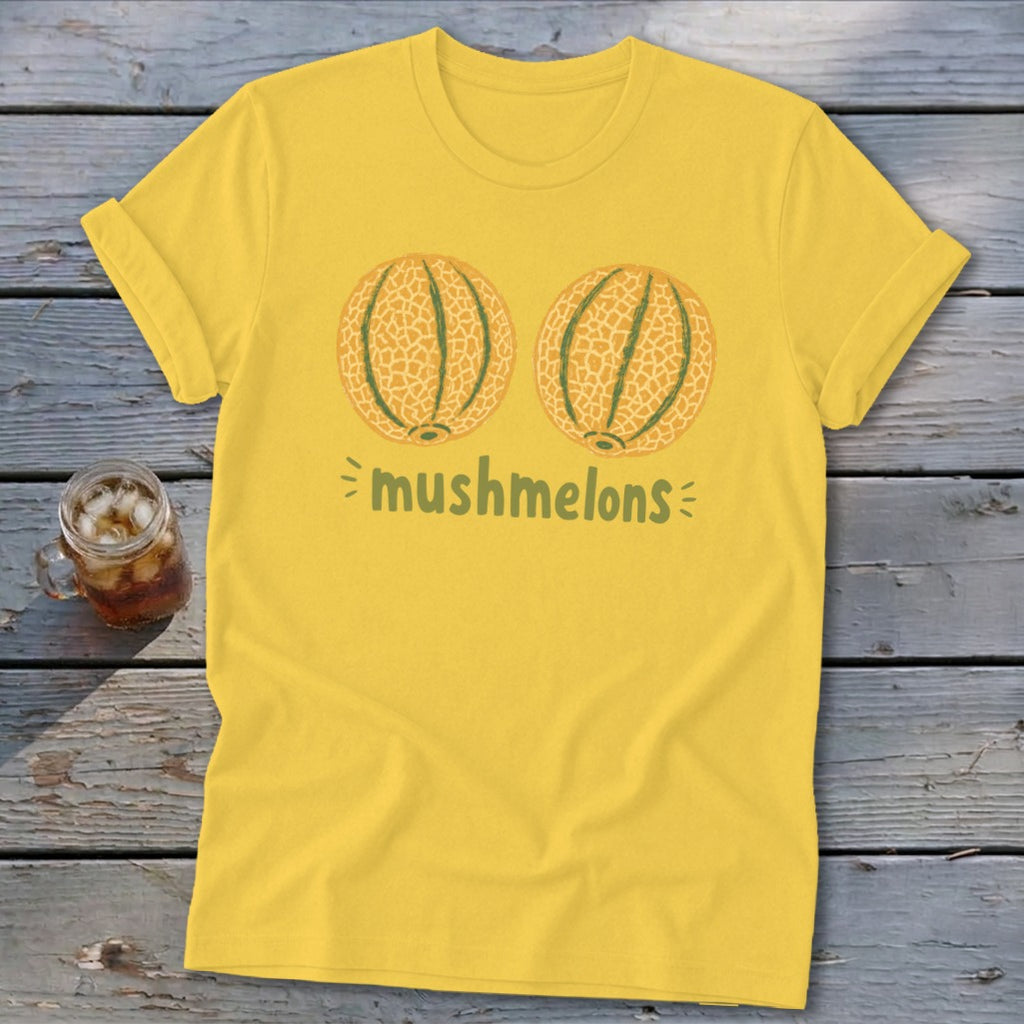 Yellow t-shirt with cartoon cantaloupes and the text "mushmelons".