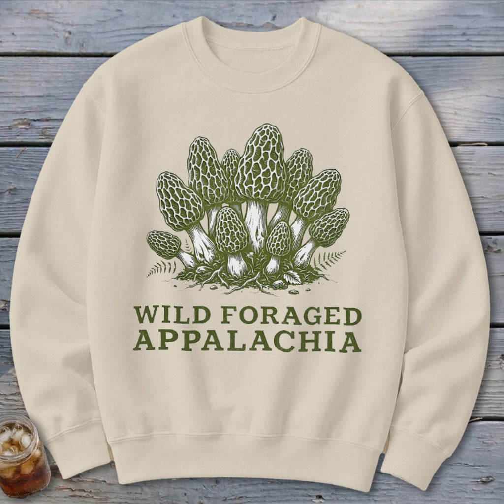 Cream sweatshirt with a vintage illustration of morel mushrooms and text "WILD FORAGED APPALACHIA."