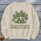Cream sweatshirt with a vintage illustration of morel mushrooms and text "WILD FORAGED APPALACHIA."