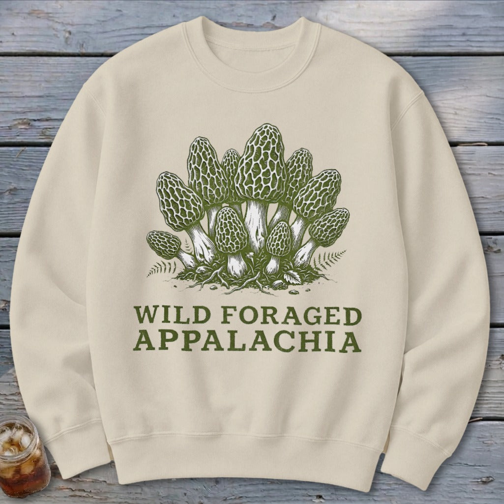 Cream sweatshirt with a vintage illustration of morel mushrooms and text "WILD FORAGED APPALACHIA."