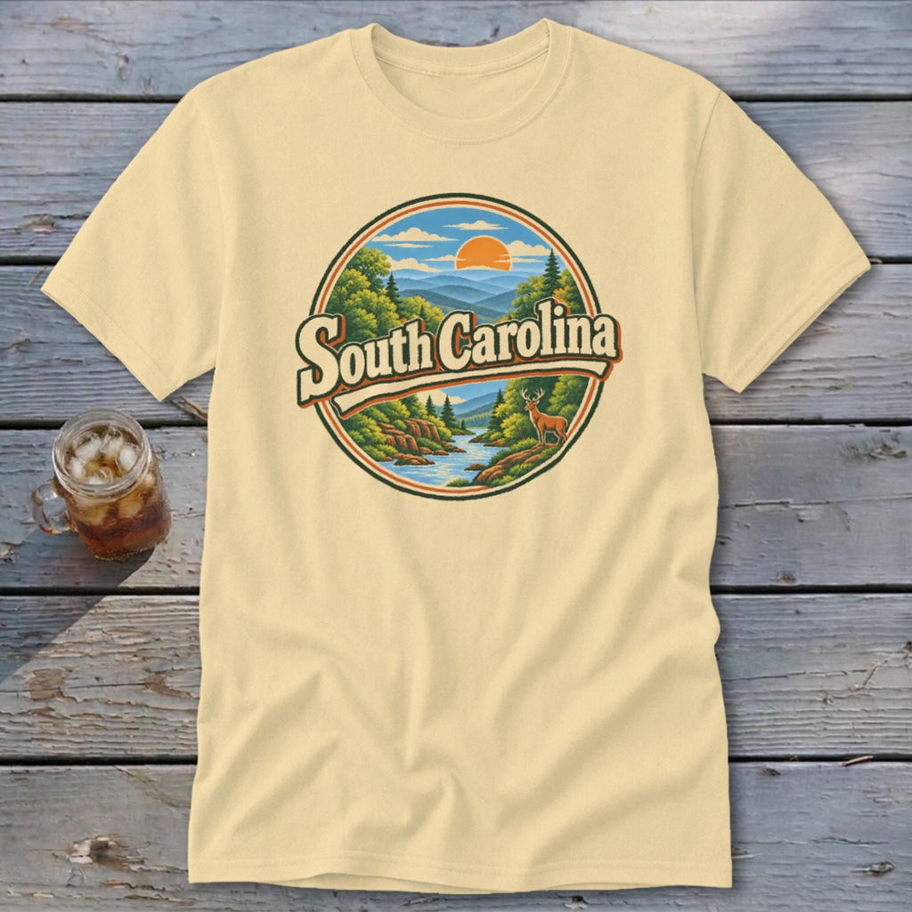 Cream t-shirt with a circular graphic of South Carolina mountains, river, and deer.