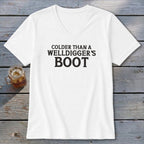 White V-neck t-shirt with text "Colder Than a Welldigger's Boot".