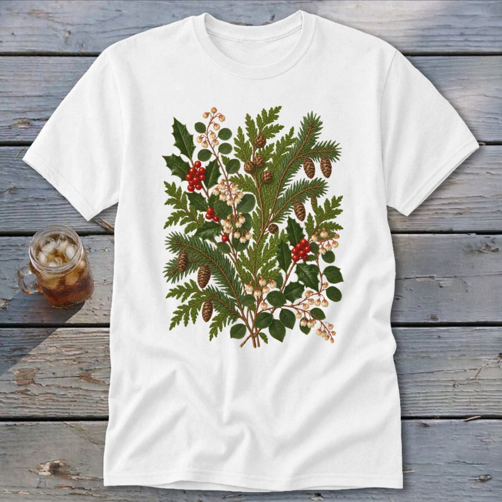 White t-shirt with a detailed botanical illustration of pine sprigs, holly, pinecones, and berries.