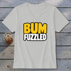 A light gray v-neck t-shirt with the words BUM FUZZLED printed in yellow and white on the front.