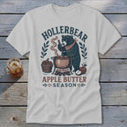Bear making apple butter with text "Hollerbear Apple Butter Season".