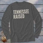 Dark grey long-sleeve shirt with "TENNESSEE RAISED" in white text.