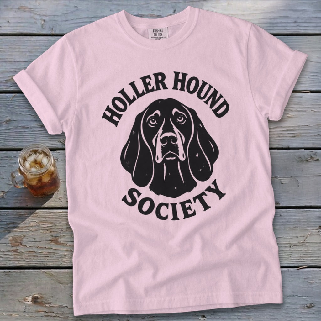 Pink t-shirt with black dog graphic and "Holler Hound Society" text.