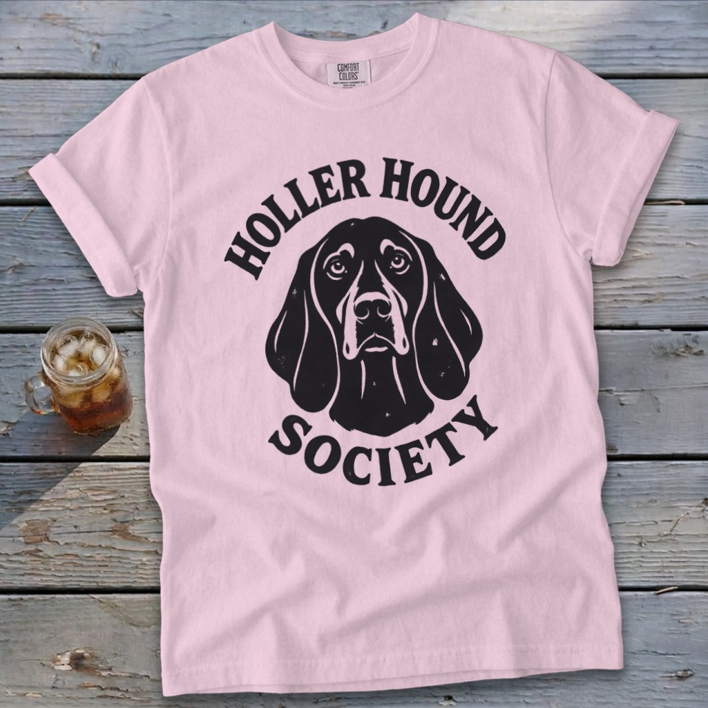 Pink t-shirt with black dog graphic and "Holler Hound Society" text.