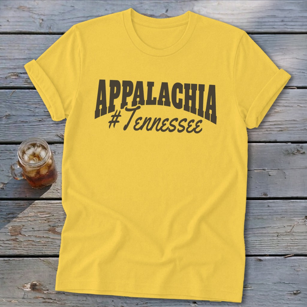 Yellow t-shirt with "APPALACHIA #Tennessee" text on weathered wood background