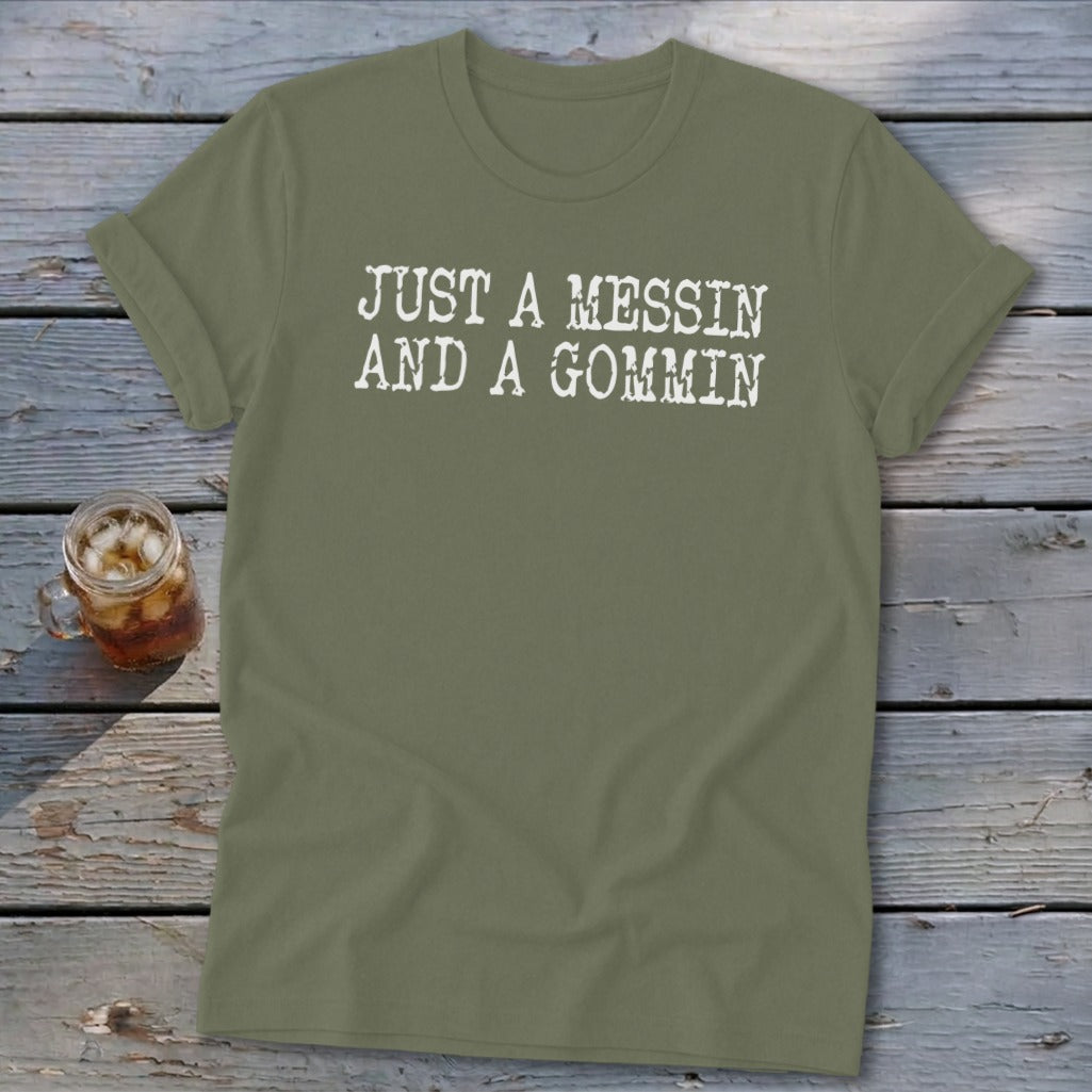 Olive green t-shirt with white text "JUST A MESSIN AND A GOMMIN".