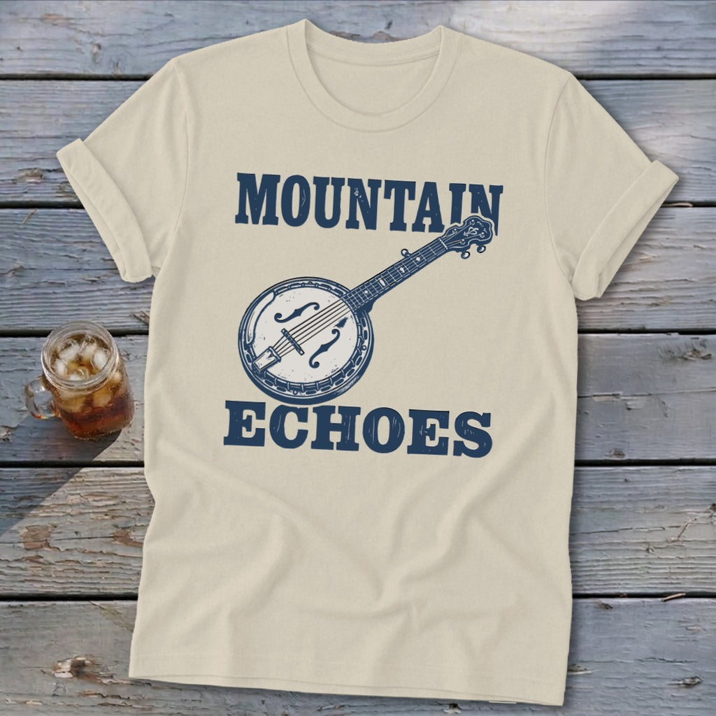 Beige t-shirt featuring a blue graphic of a banjo and the text Mountain Echoes.