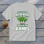 Light gray t-shirt with graphic of ramp plants and text reading If You See Me In The Woods I Am Huntin Ramps.