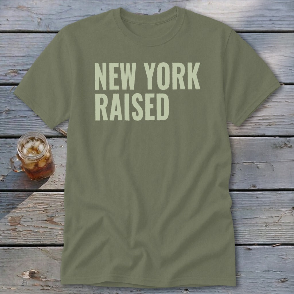 Olive green t-shirt with "NEW YORK RAISED" text.