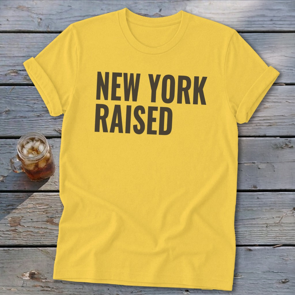 Yellow t-shirt with "NEW YORK RAISED" text in dark gray.