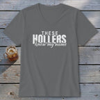 Gray v-neck t-shirt with white text "THESE HOLLERS know my name".