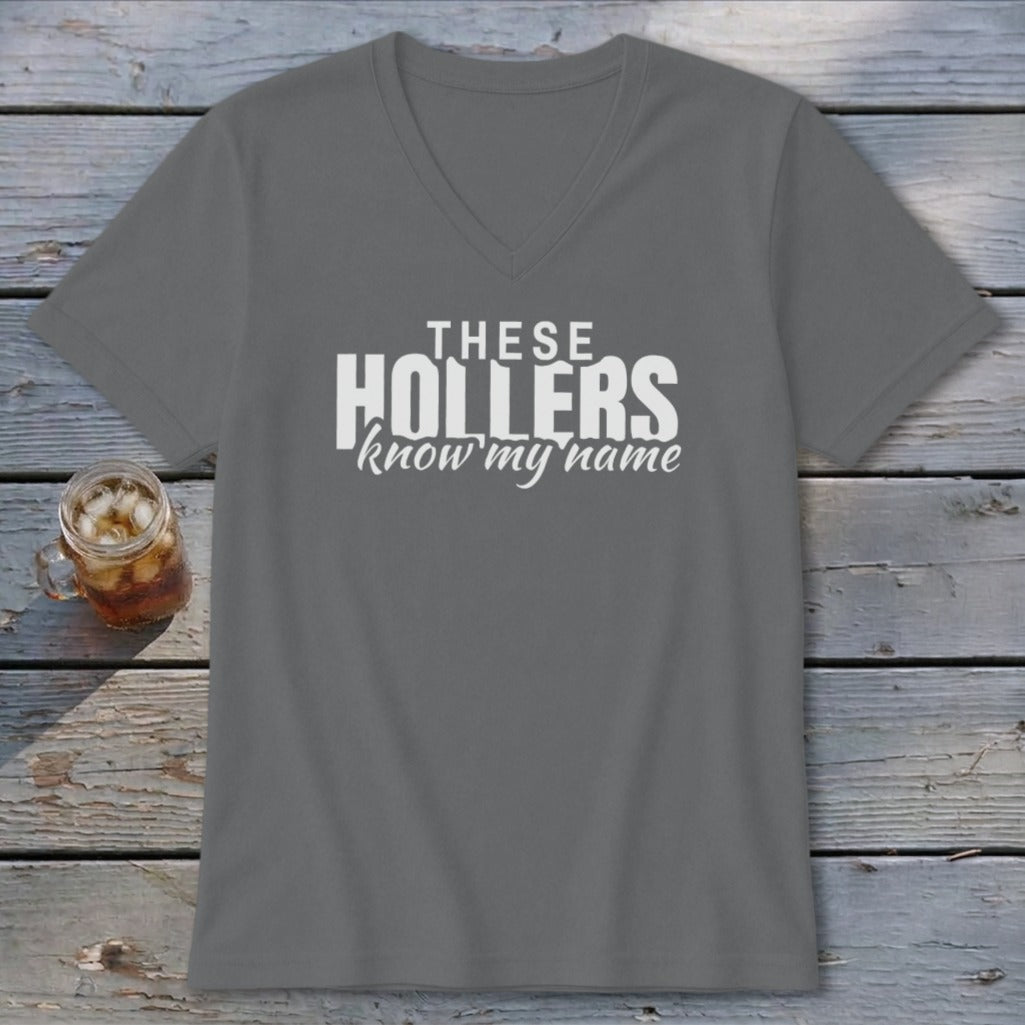 Gray v-neck t-shirt with white text "THESE HOLLERS know my name".