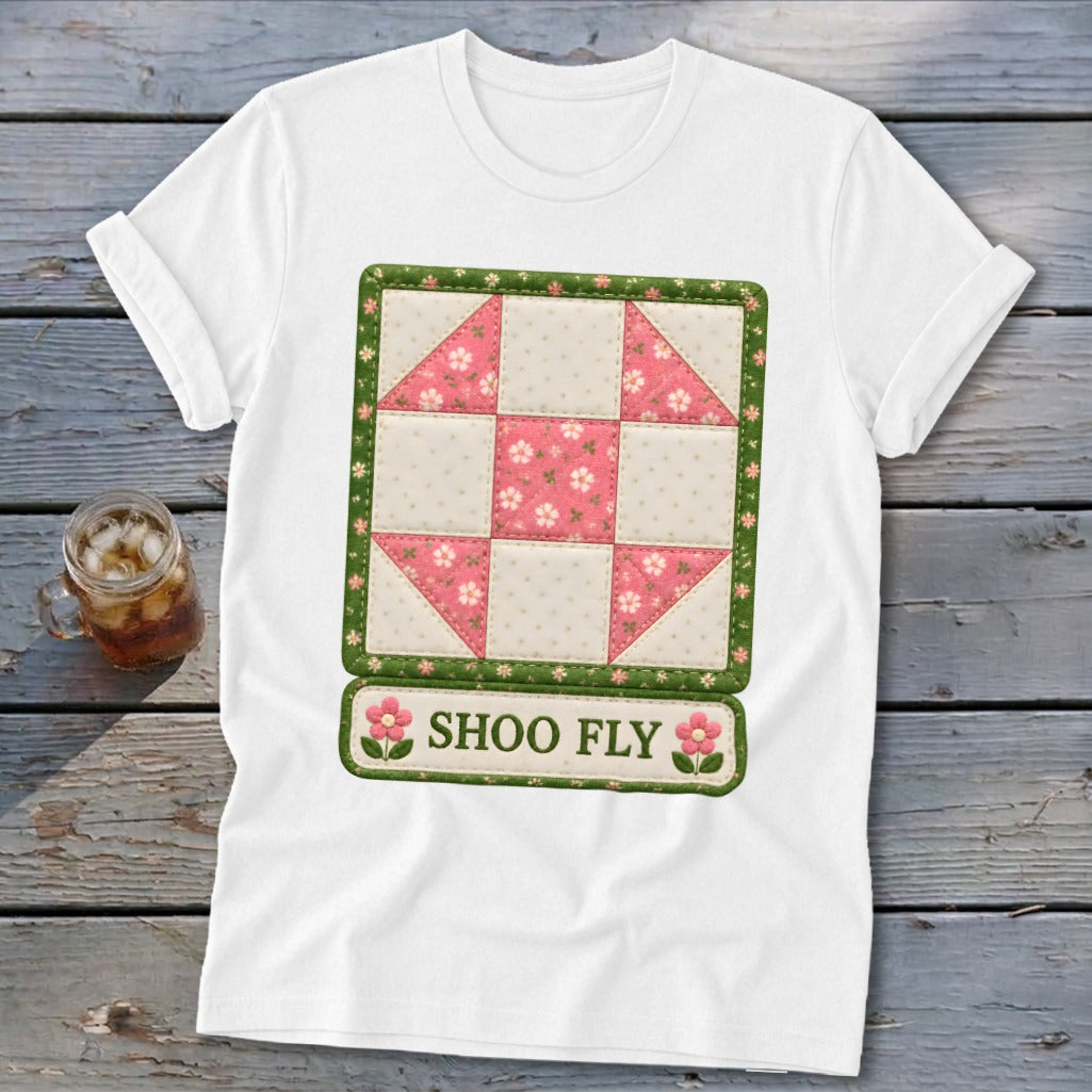 White t-shirt with a Shoo Fly quilt block graphic and text.