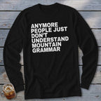 Black long-sleeve shirt with white text reading "Anymore people just don't understand mountain grammar."