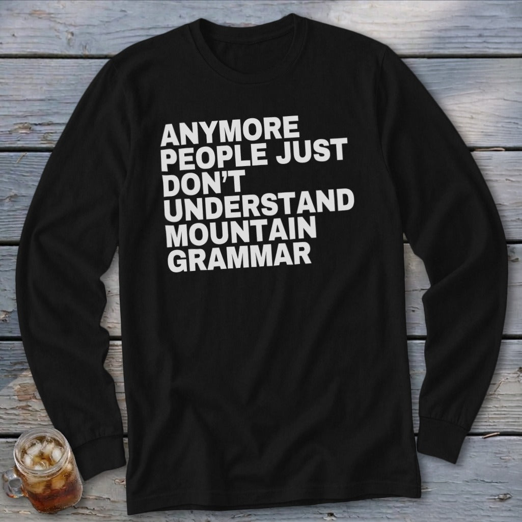 Black long-sleeve shirt with white text reading "Anymore people just don't understand mountain grammar."