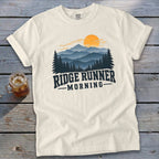 Cream t-shirt with "Ridge Runner Morning" text and a mountain sunrise graphic.