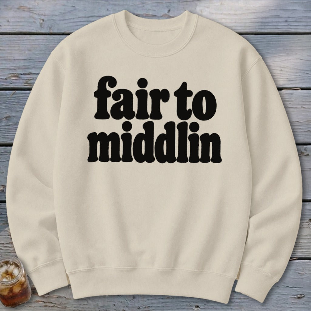 Cream sweatshirt with black text reading "fair to middlin'".