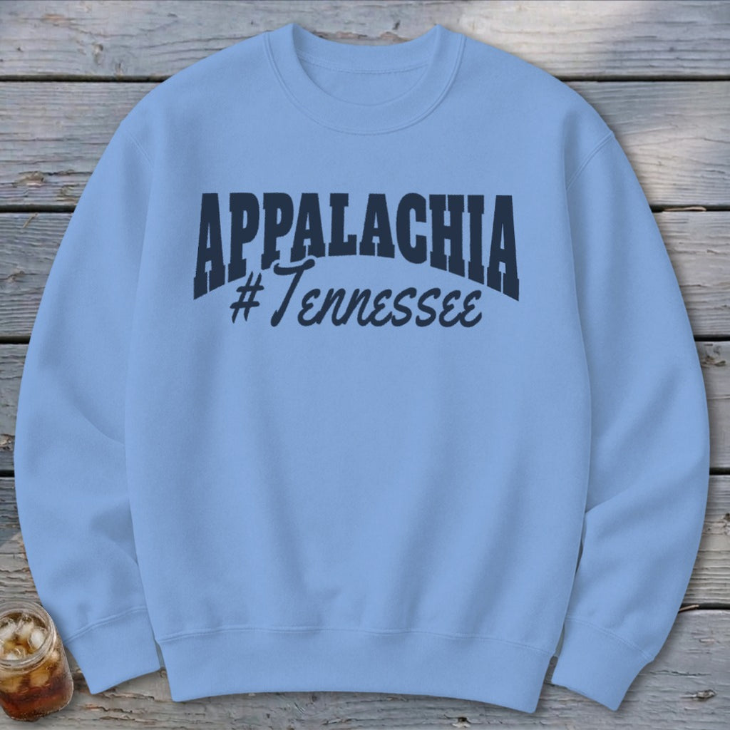 Light blue crewneck sweatshirt with "APPALACHIA #Tennessee" graphic in navy blue.