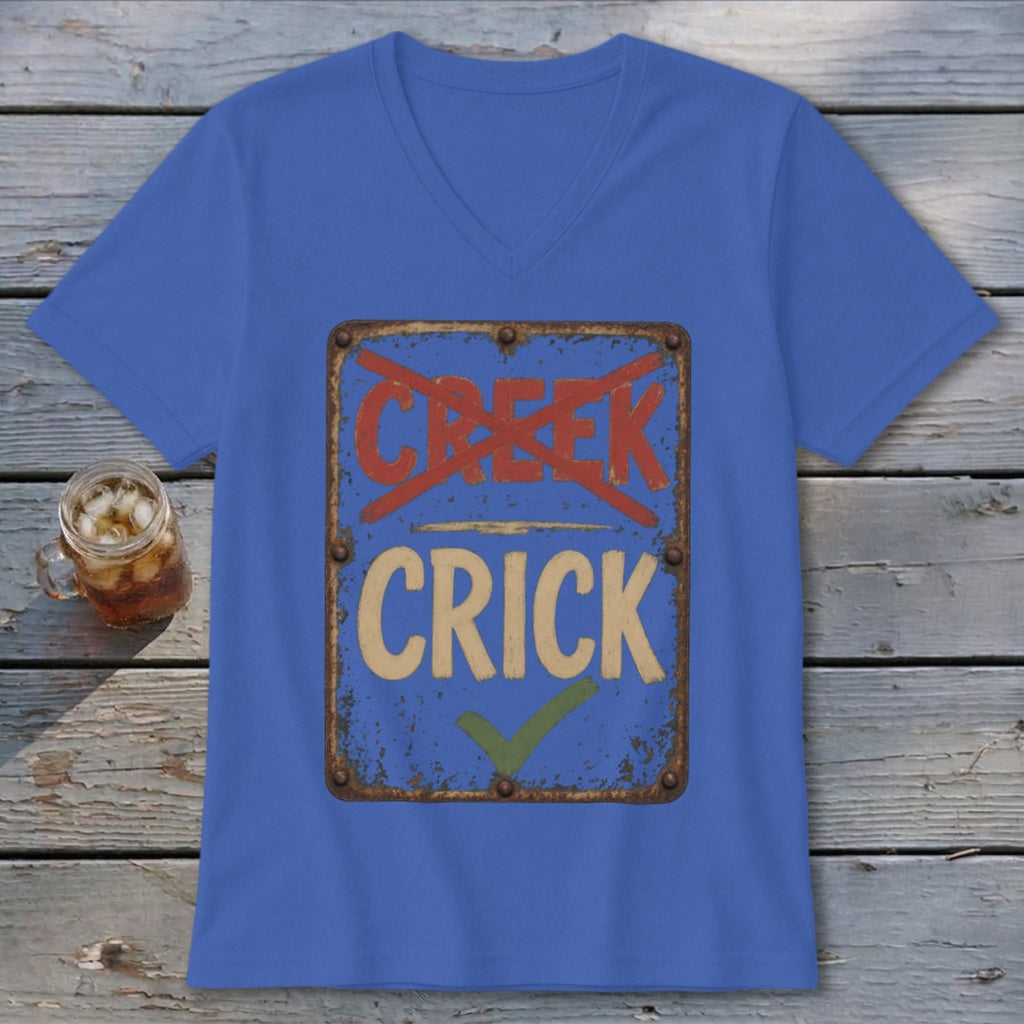 Blue t-shirt with a distressed sign graphic that reads "CREEK" crossed out and "CRICK" with a checkmark.