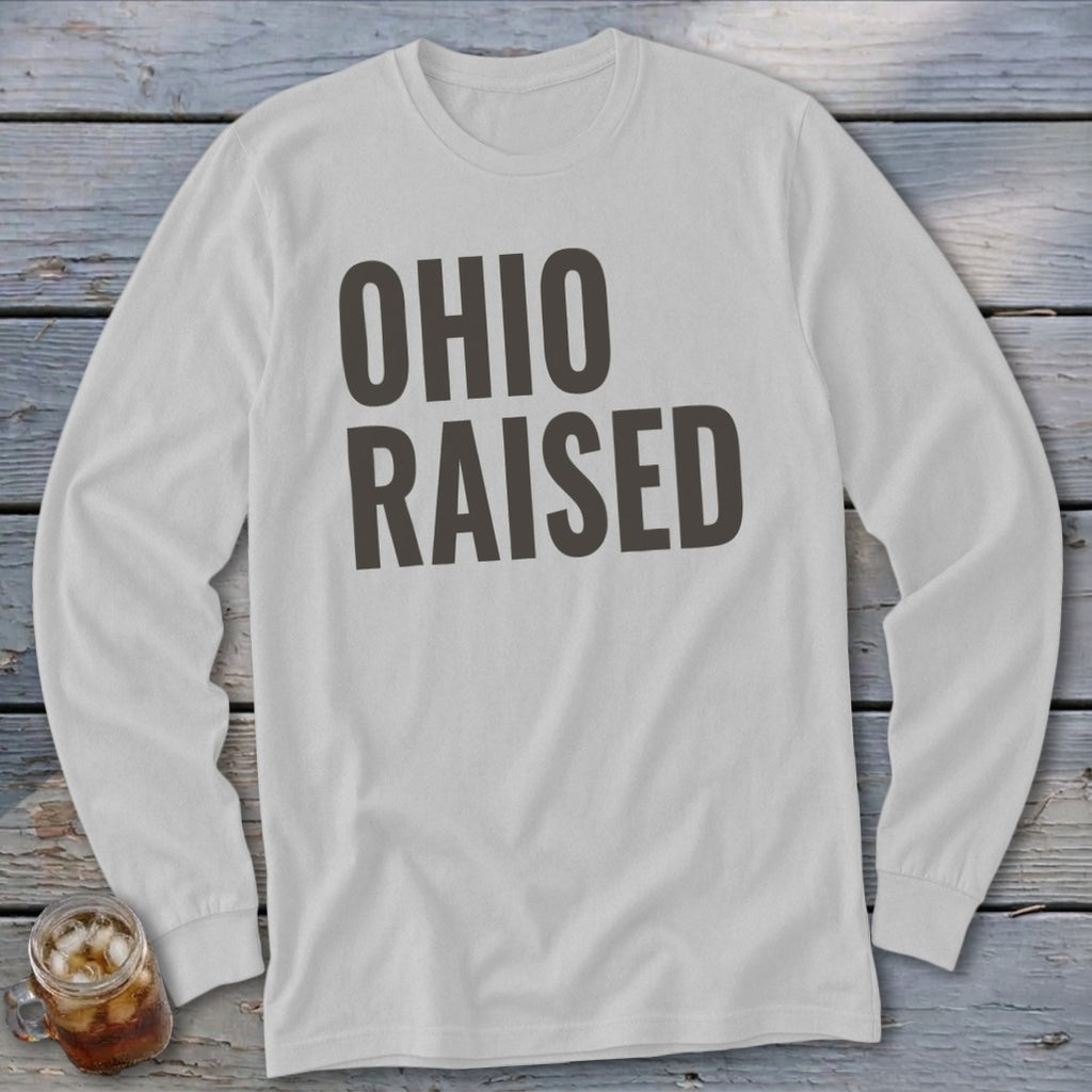 White long-sleeve shirt with bold dark gray text reading "OHIO RAISED".