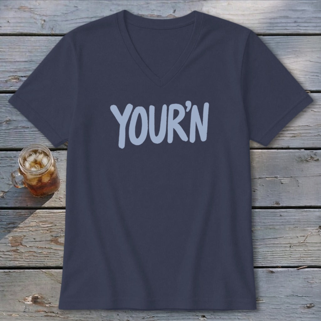 Dark blue v-neck t-shirt with light blue "YOUR'N" text and a glass of iced tea.