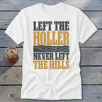 White t-shirt with text "LEFT THE HOLLER NEVER LEFT THE HILLS".