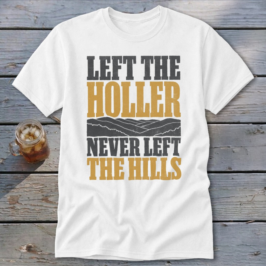 White t-shirt with text "LEFT THE HOLLER NEVER LEFT THE HILLS".