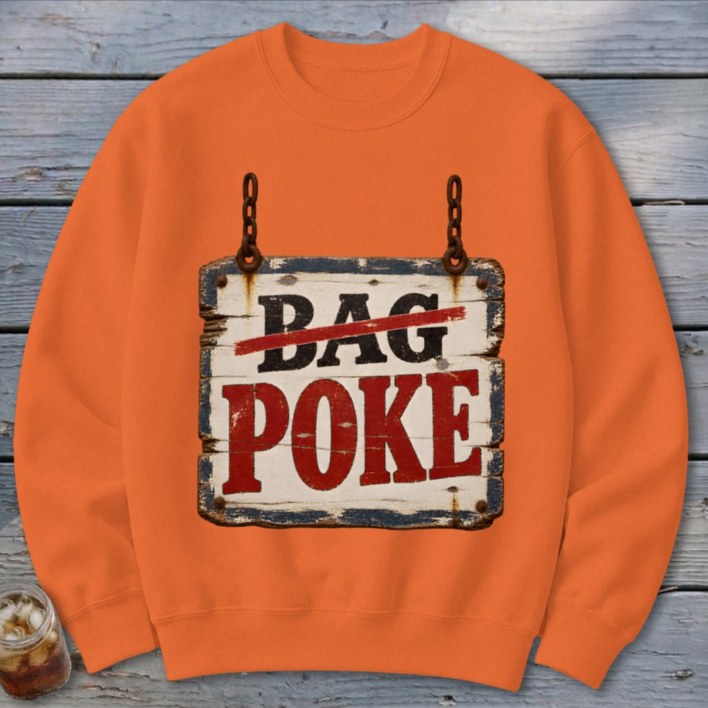 Orange crewneck sweatshirt with a graphic of a rustic wooden sign reading BAG POKE.
