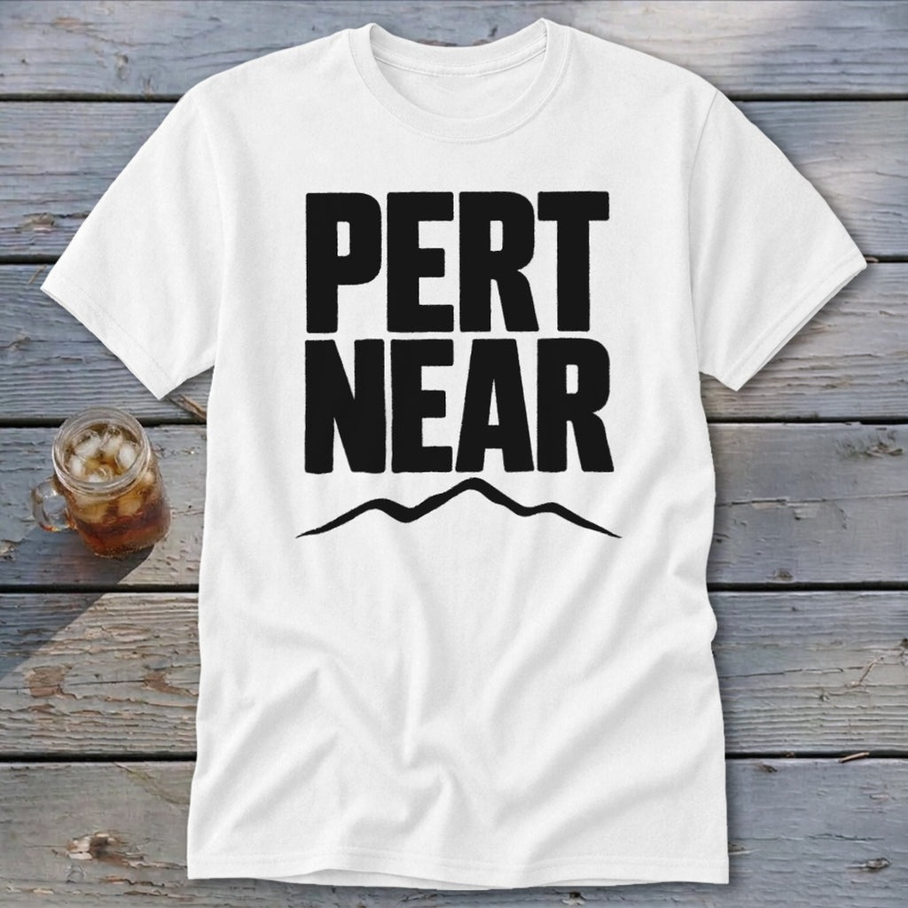 White t-shirt with bold black text reading PERT NEAR above a mountain outline graphic.
