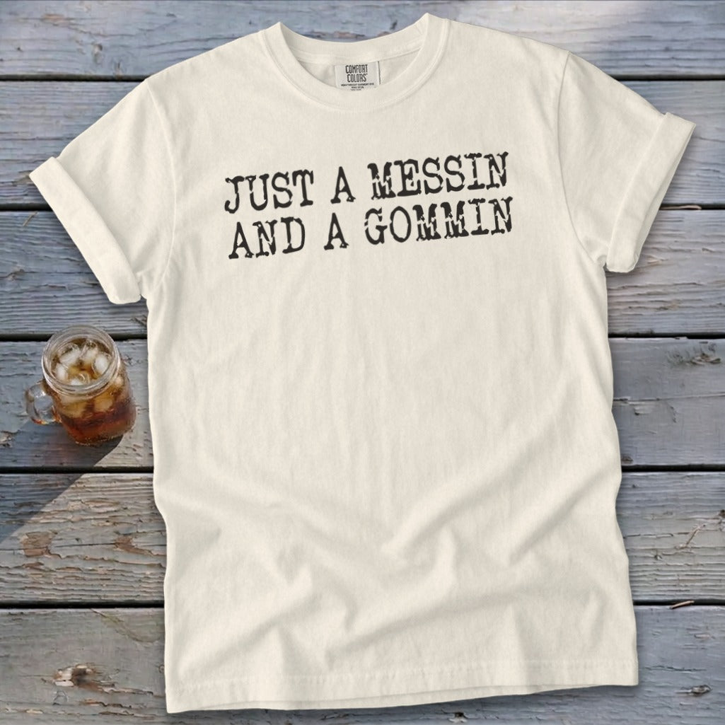 Cream t-shirt with black text reading "JUST A MESSIN AND A GOMMIN".