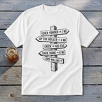 White t-shirt featuring a black graphic of a rustic wooden signpost with directional distance text.