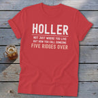Red t-shirt with white text: "HOLLER NOT JUST WHERE YOU LIVE BUT HOW YOU CALL SOMEONE FIVE RIDGES OVER"