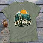 Olive green t-shirt with "Ridge Walking Society" text and hiker graphic.
