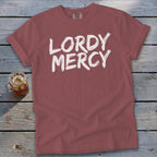 Maroon t-shirt with "LORDY MERCY" text and a drink in a mason jar.