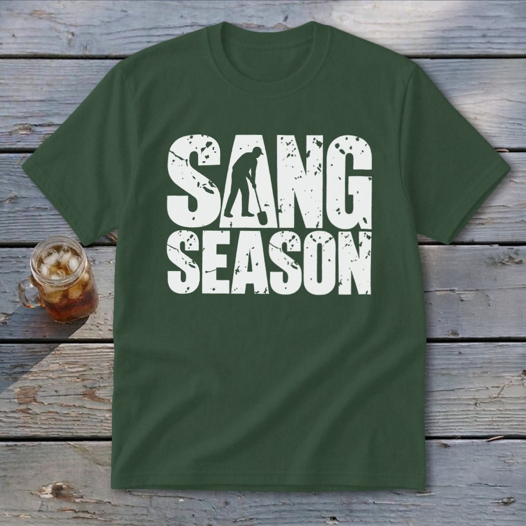 Dark green short-sleeve t-shirt with distressed white text reading SANG SEASON and a graphic of a person digging.