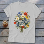 Light grey t-shirt with a bouquet design and text "DECORATION DAY BLOOMS".